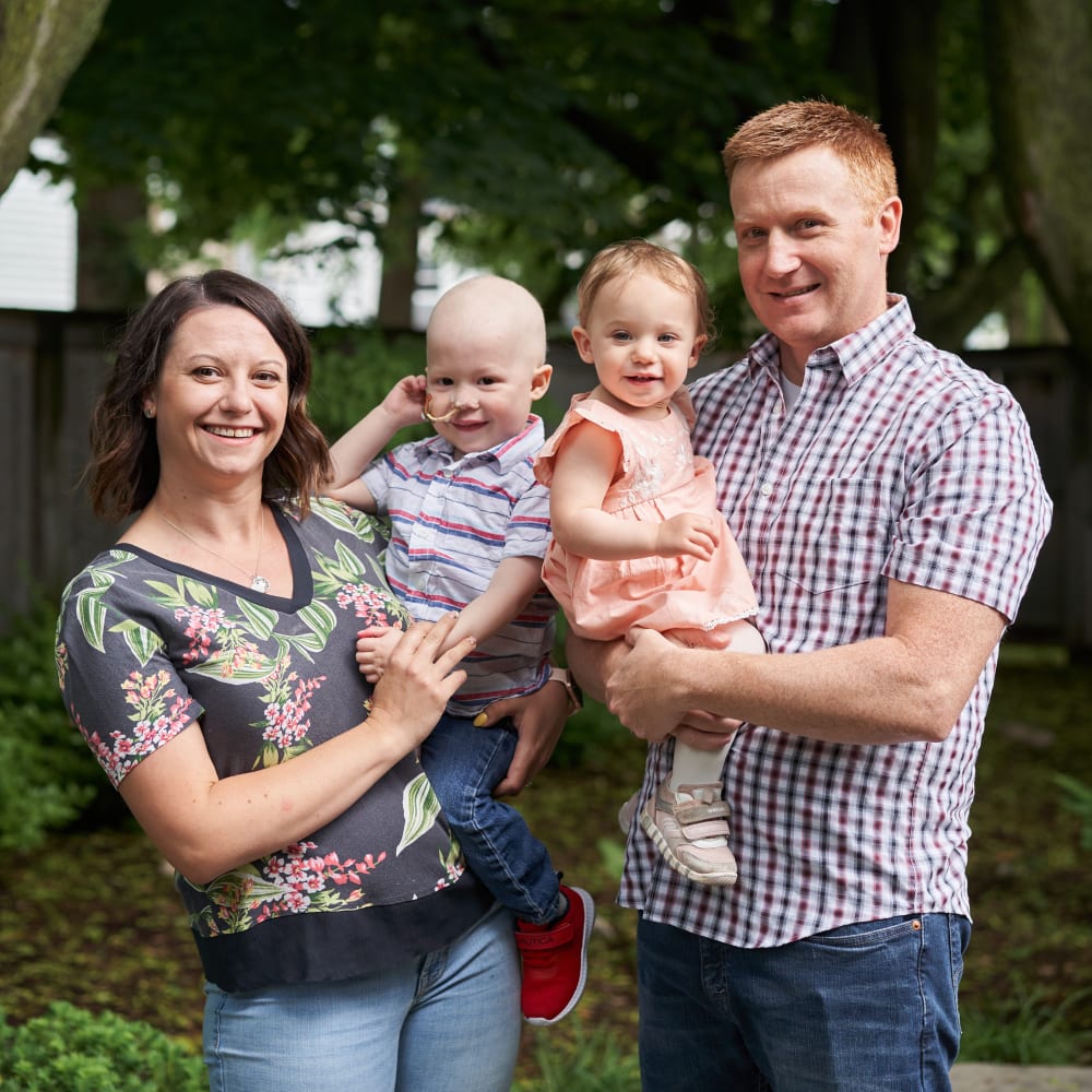 Family of four outdoors